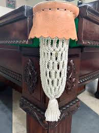 Canto da mesa de bilhar com caçapa